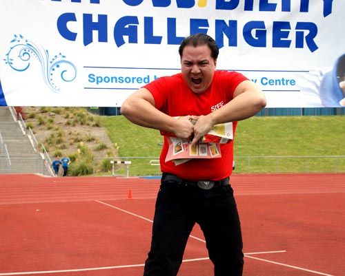 Albert Walter tears a phone book in two at the Impossibility-Challenger Games Albert Walter tears a phone book in two at the Impossibility-Challenger Games